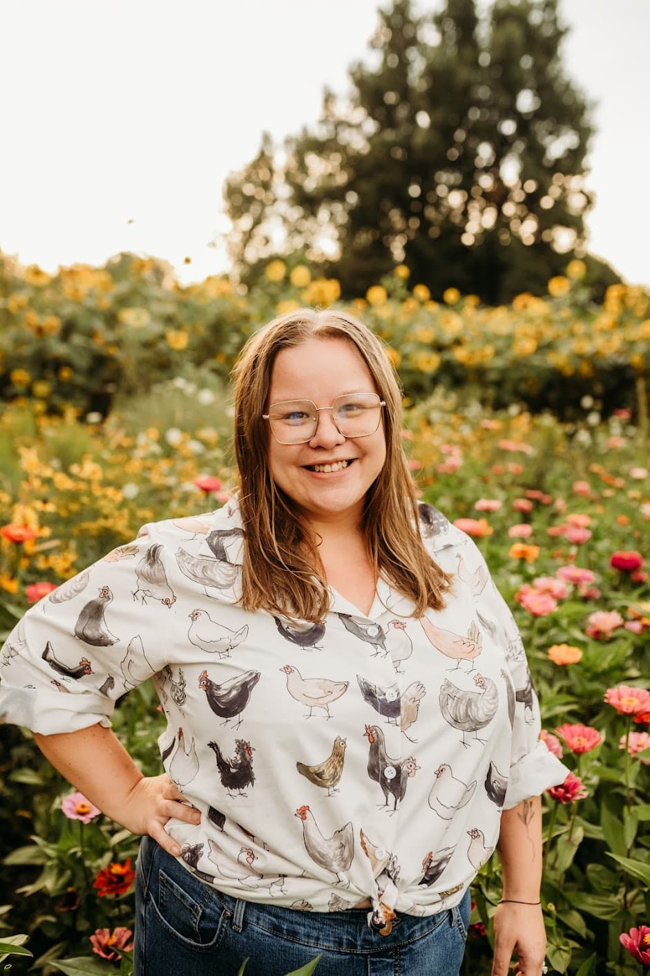 Samantha Ford outdoors among flowers